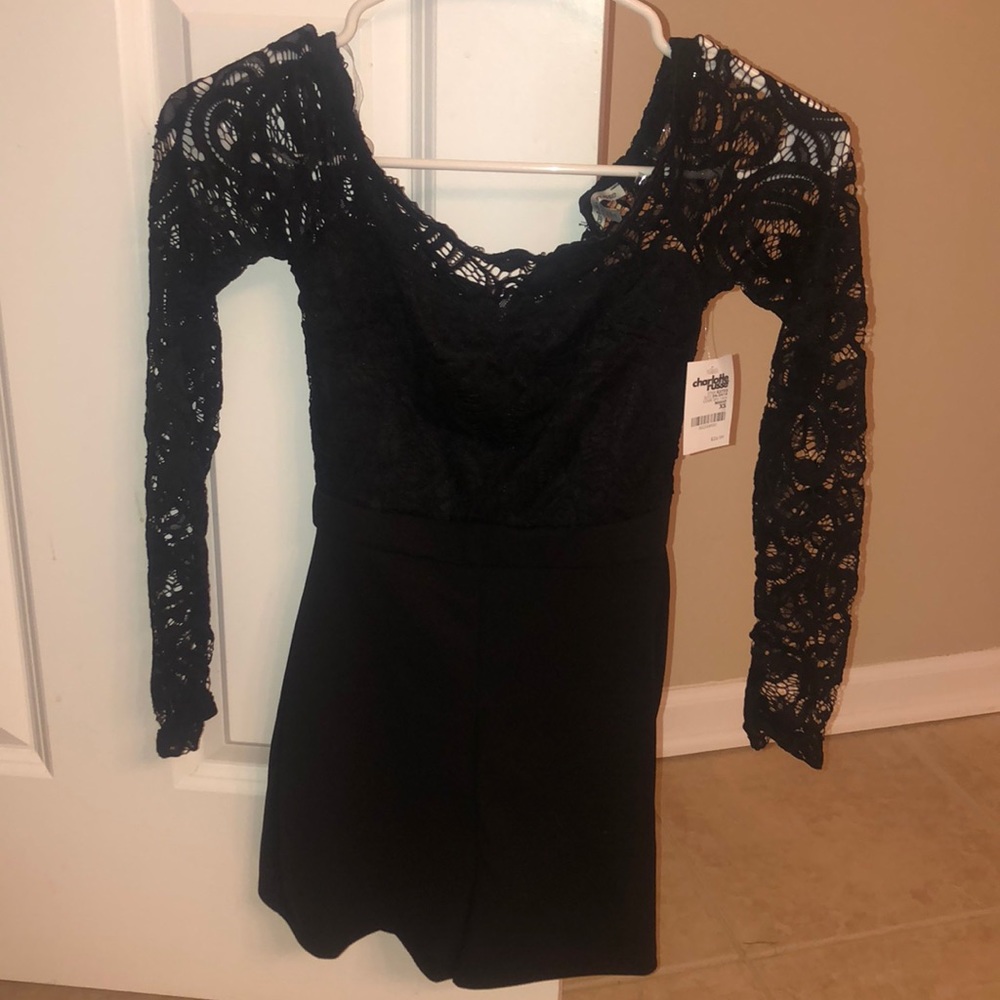 Tight fitting black laced romper